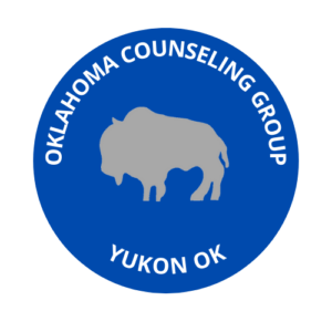 Oklahoma Counseling Group Logo Blue Circle with Grey Bison Image